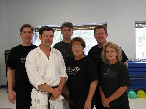 Chapter members and karate instructors raising money for the Muscular Dystrophy Association in September are (back row, l-r) Rob Morse, Keith Ford and Kevin Swanner. In the front row are (l-r) Wes Slone, Theresa Thacker and Mary Hopper.